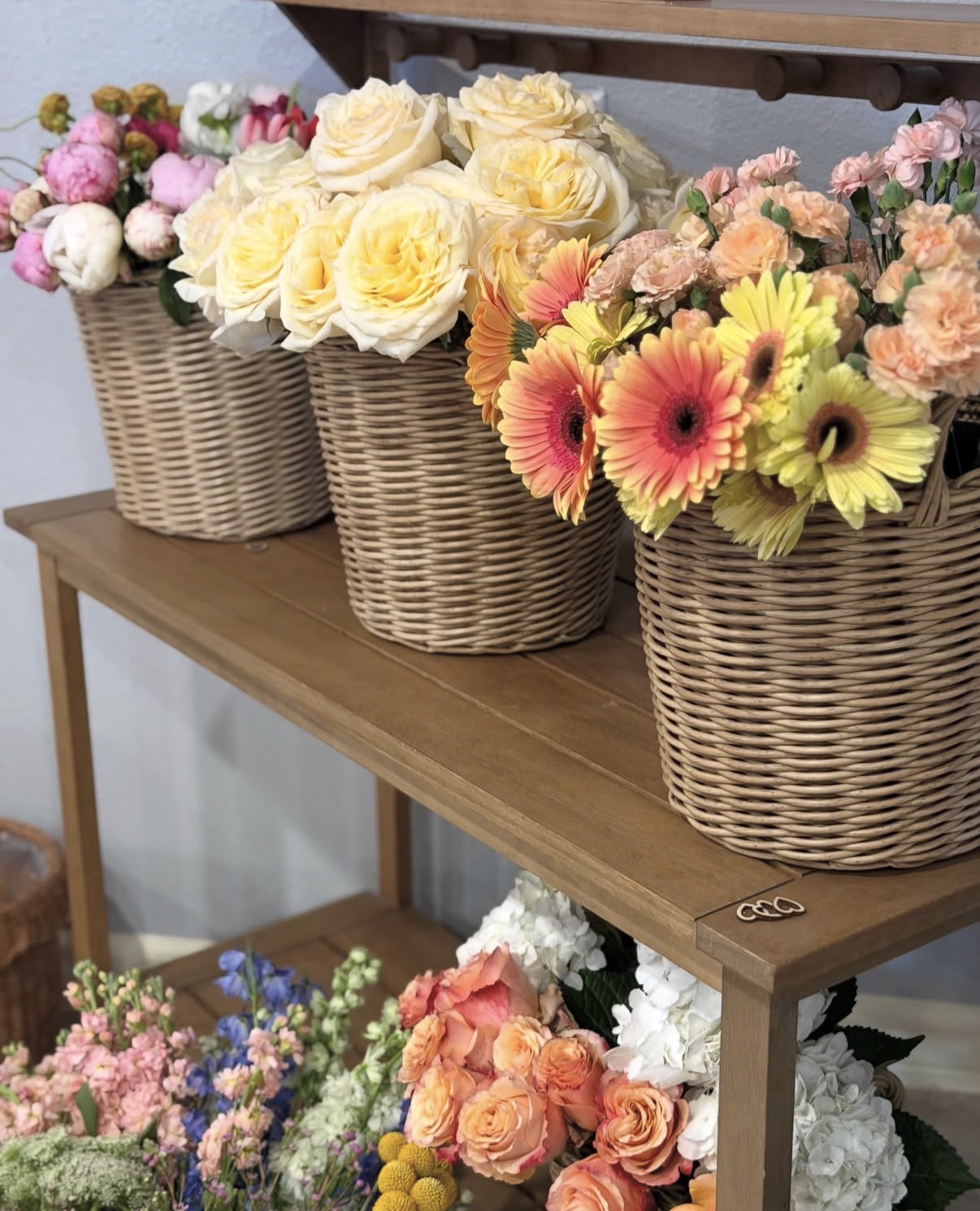 Baskets of fresh market flowers