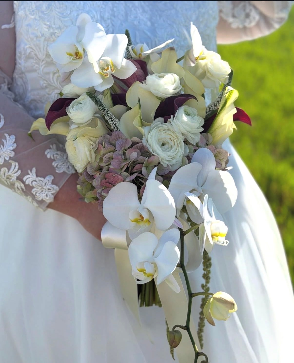 Cascading white orchid bridal bouquet